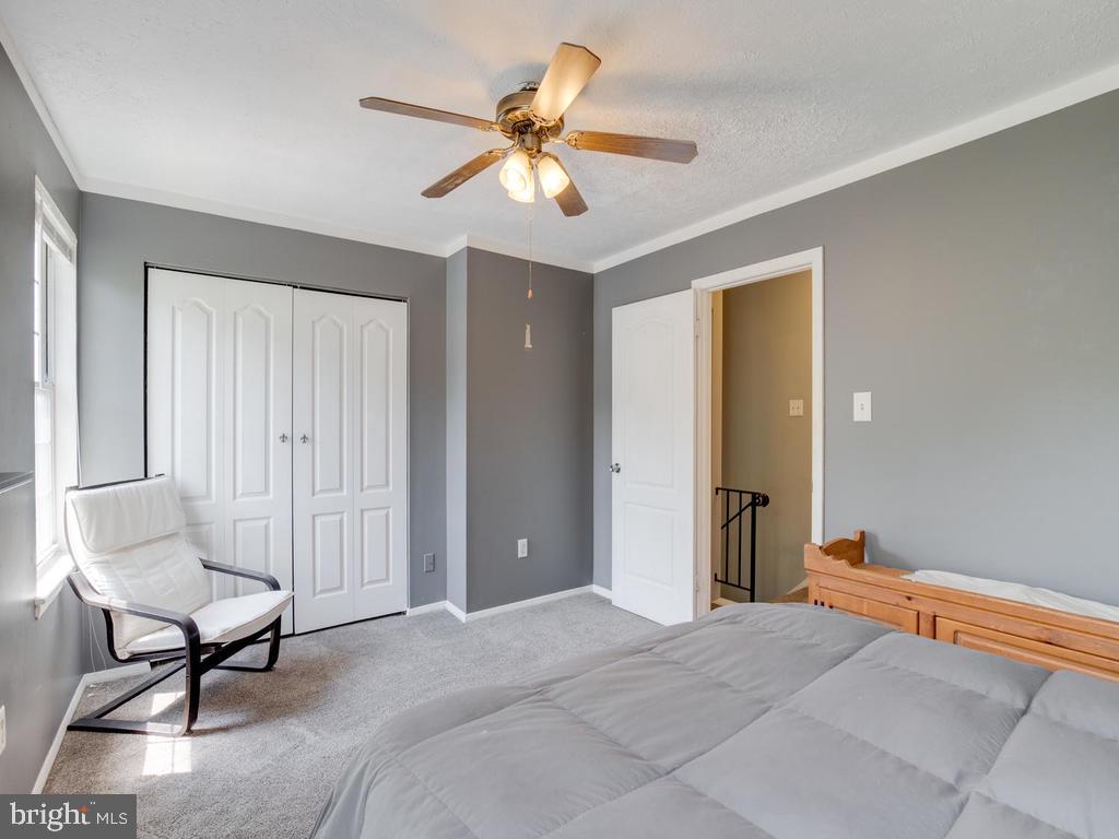4078 Rustico Road Baltimore, MD 21220 - Photo 22 of 40 Ceiling fan and large closet in main bedroom