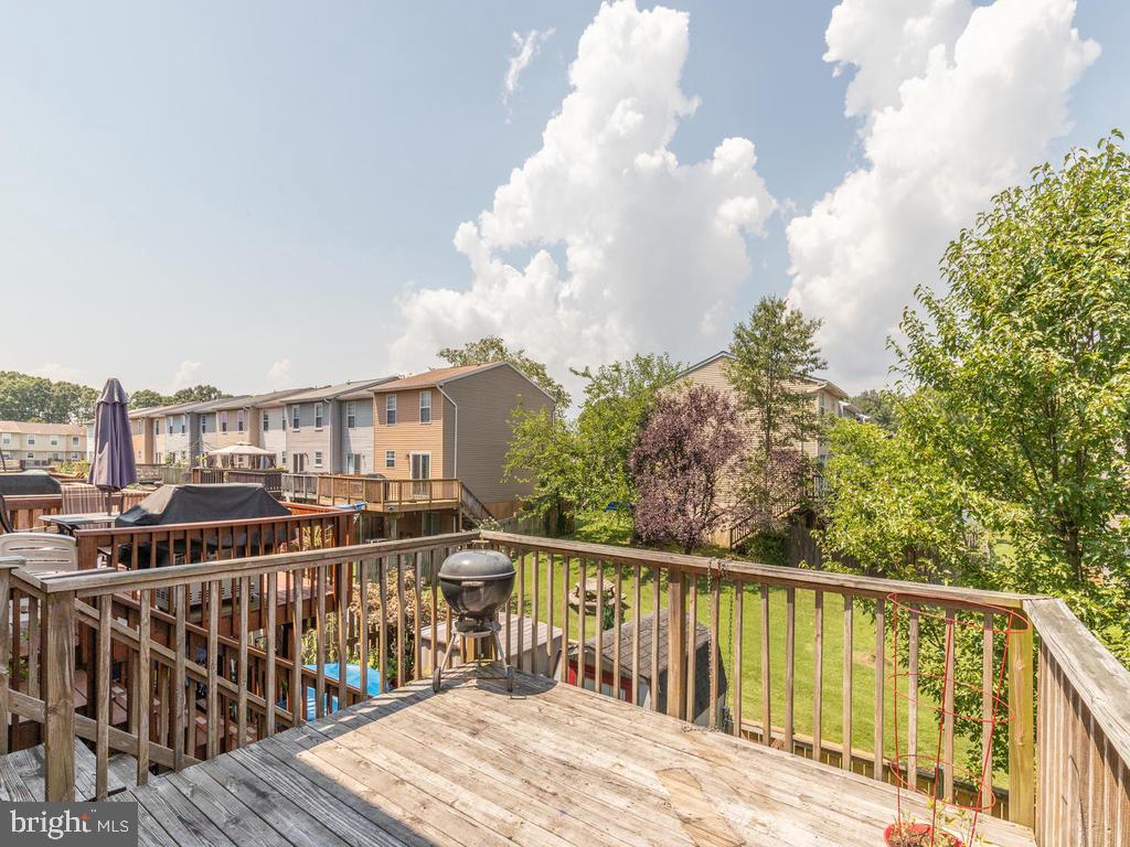4078 Rustico Road Baltimore, MD 21220 - Photo 4 of 40 Wood deck with stairs to yard