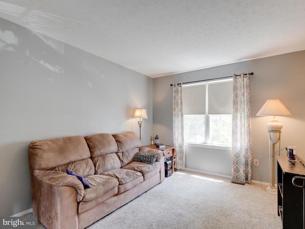 4078 Rustico Road Baltimore, MD 21220 - Photo 8 of 40 Great natural light in living room