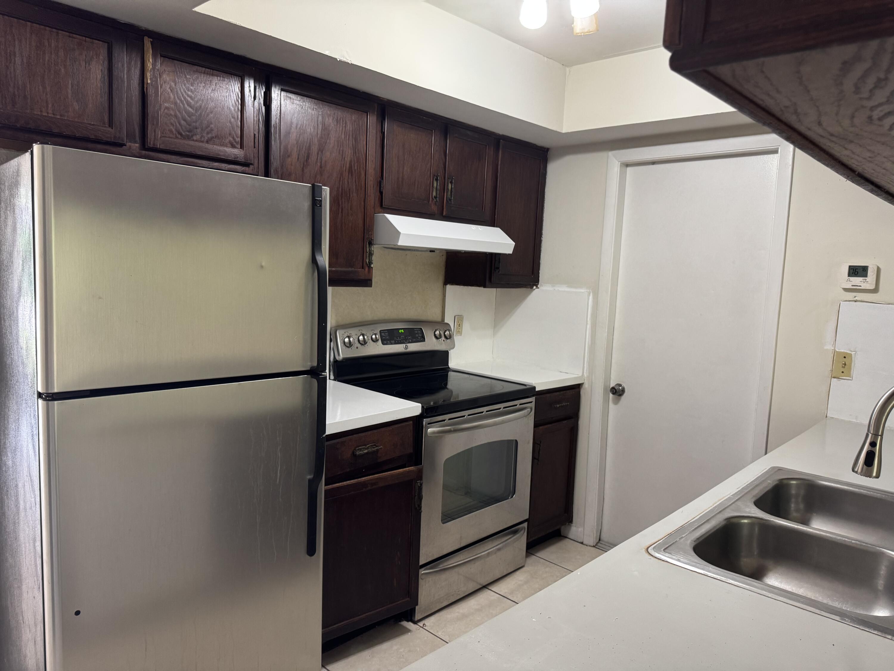 1119 Goldenrod Road, Unit 1119 Wellington, FL 33414 - Photo 7 of 16 IMG_3979