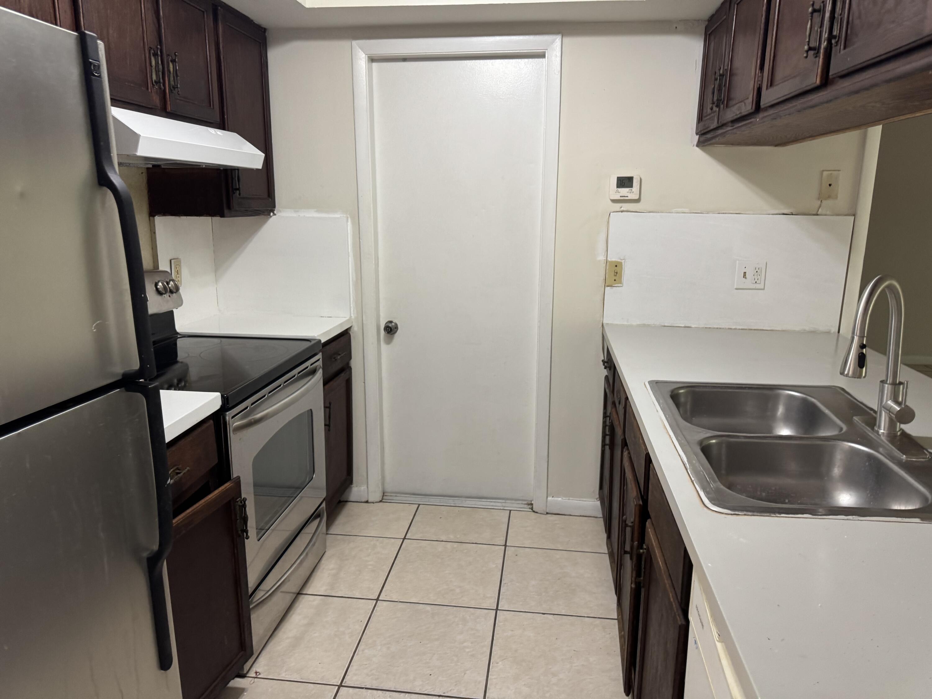 1119 Goldenrod Road, Unit 1119 Wellington, FL 33414 - Photo 8 of 16 IMG_3980