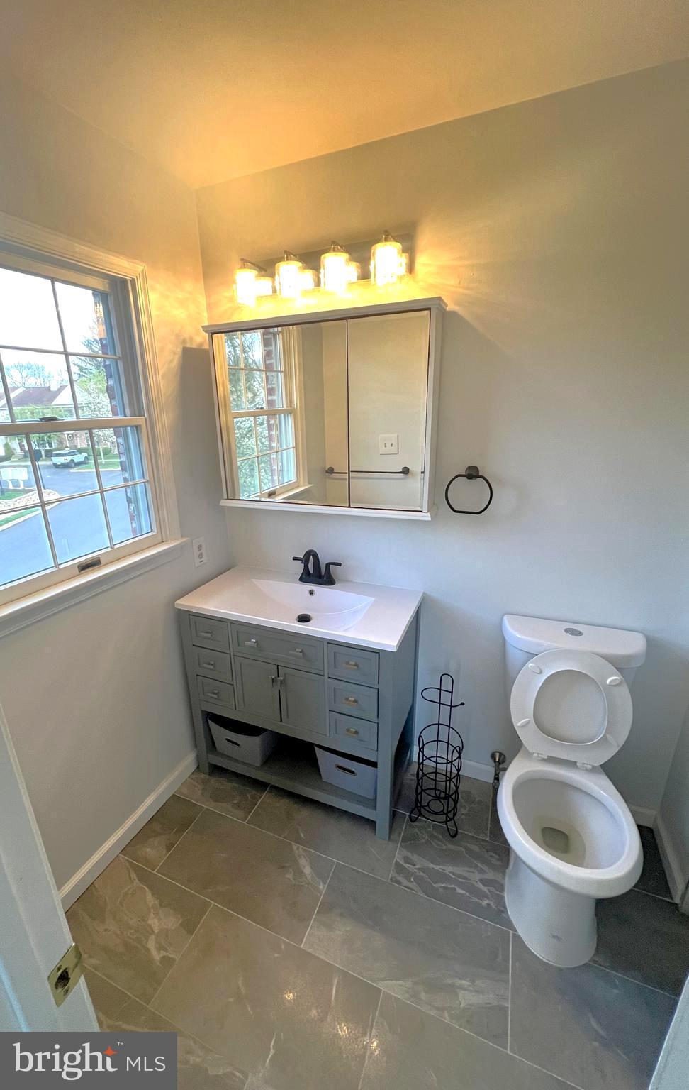 2 Washington Square Doylestown, PA 18901 - Photo 14 of 27 a bathroom with a sink mirror and toilet