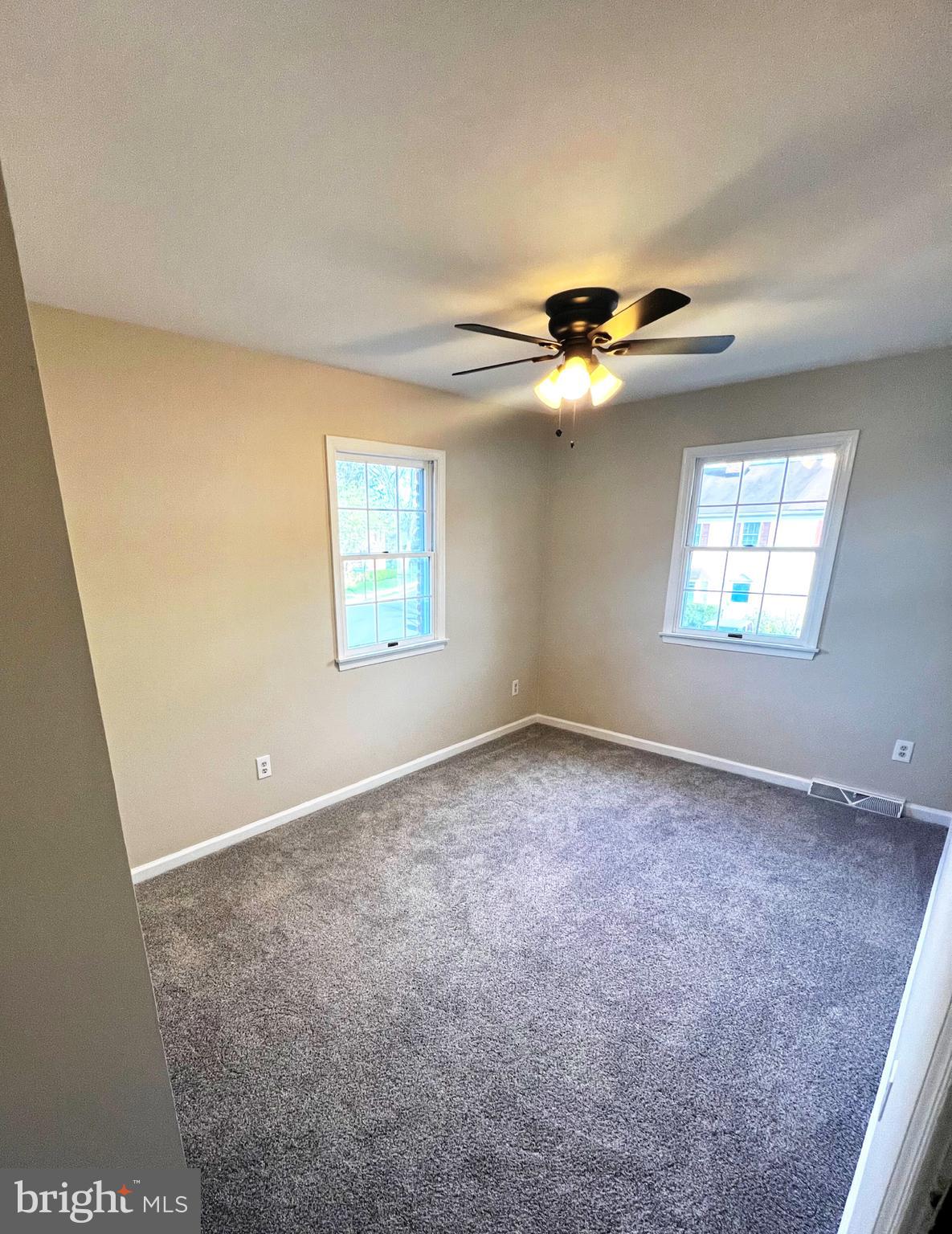 2 Washington Square Doylestown, PA 18901 - Photo 16 of 27 an empty room with windows and fan