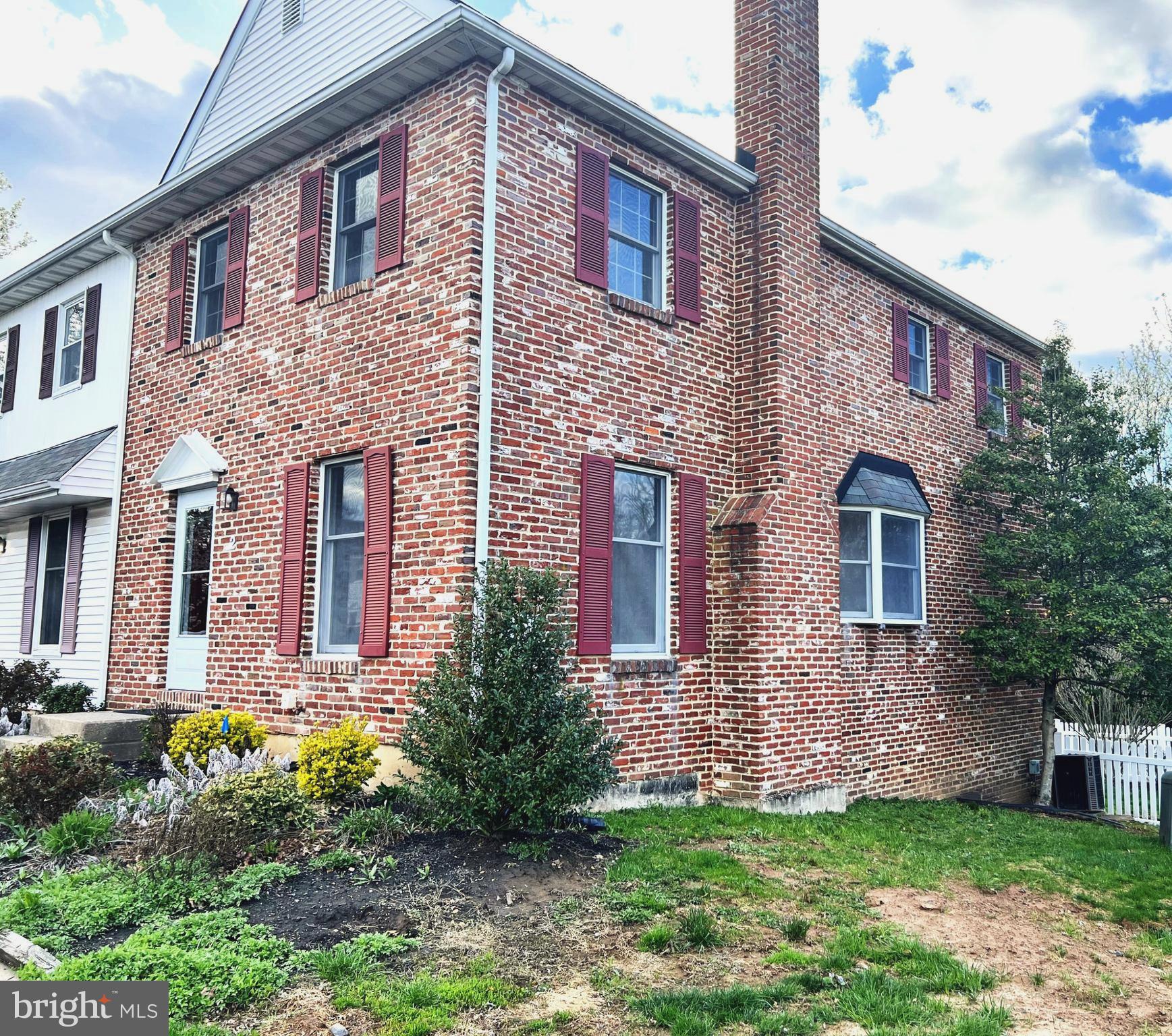 2 Washington Square Doylestown, PA 18901 - Photo 2 of 27 a front view of a house with a yard