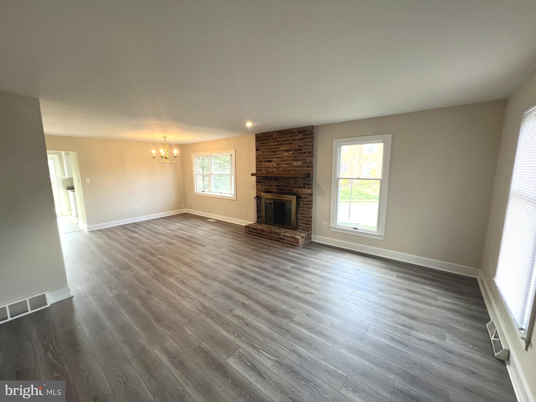 2 Washington Square Doylestown, PA 18901 - Photo 5 of 27 wooden floor in an empty room with a window
