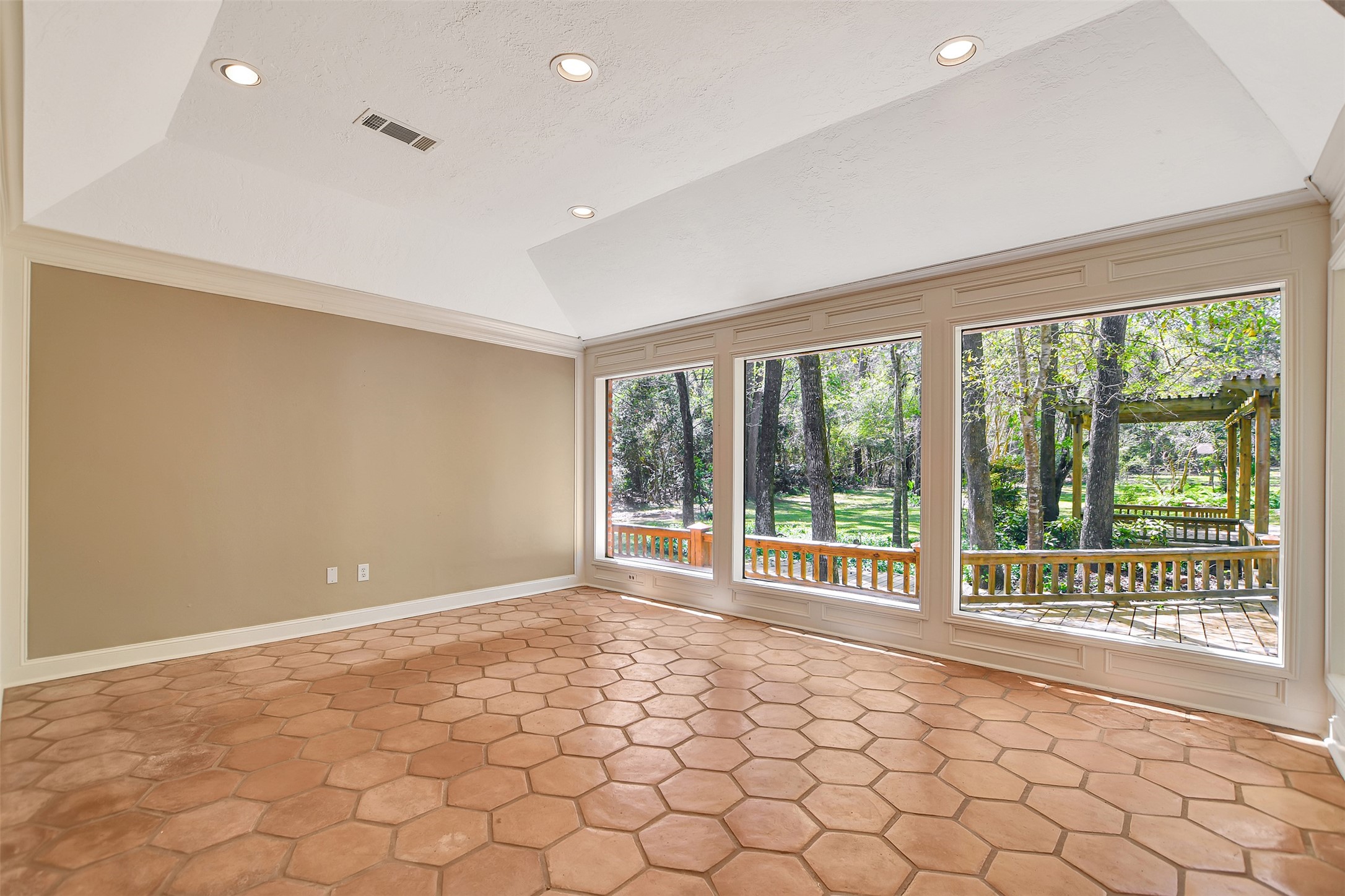 16002 Koenig Lane Conroe, TX 77384 - Photo 13 of 48 a view of an empty room with a window