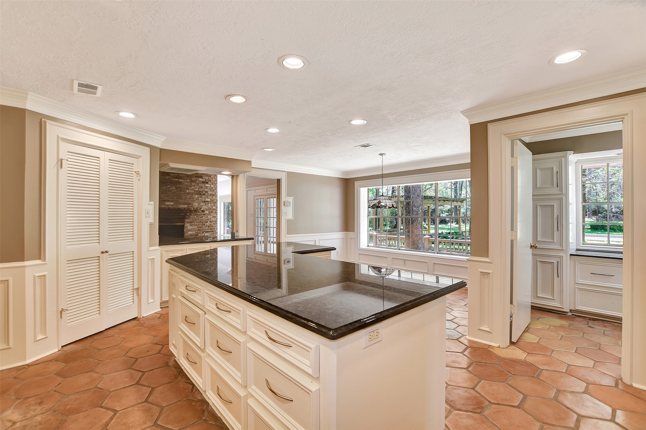 16002 Koenig Lane Conroe, TX 77384 - Photo 17 of 48 a kitchen with granite countertop a sink and a stove top oven