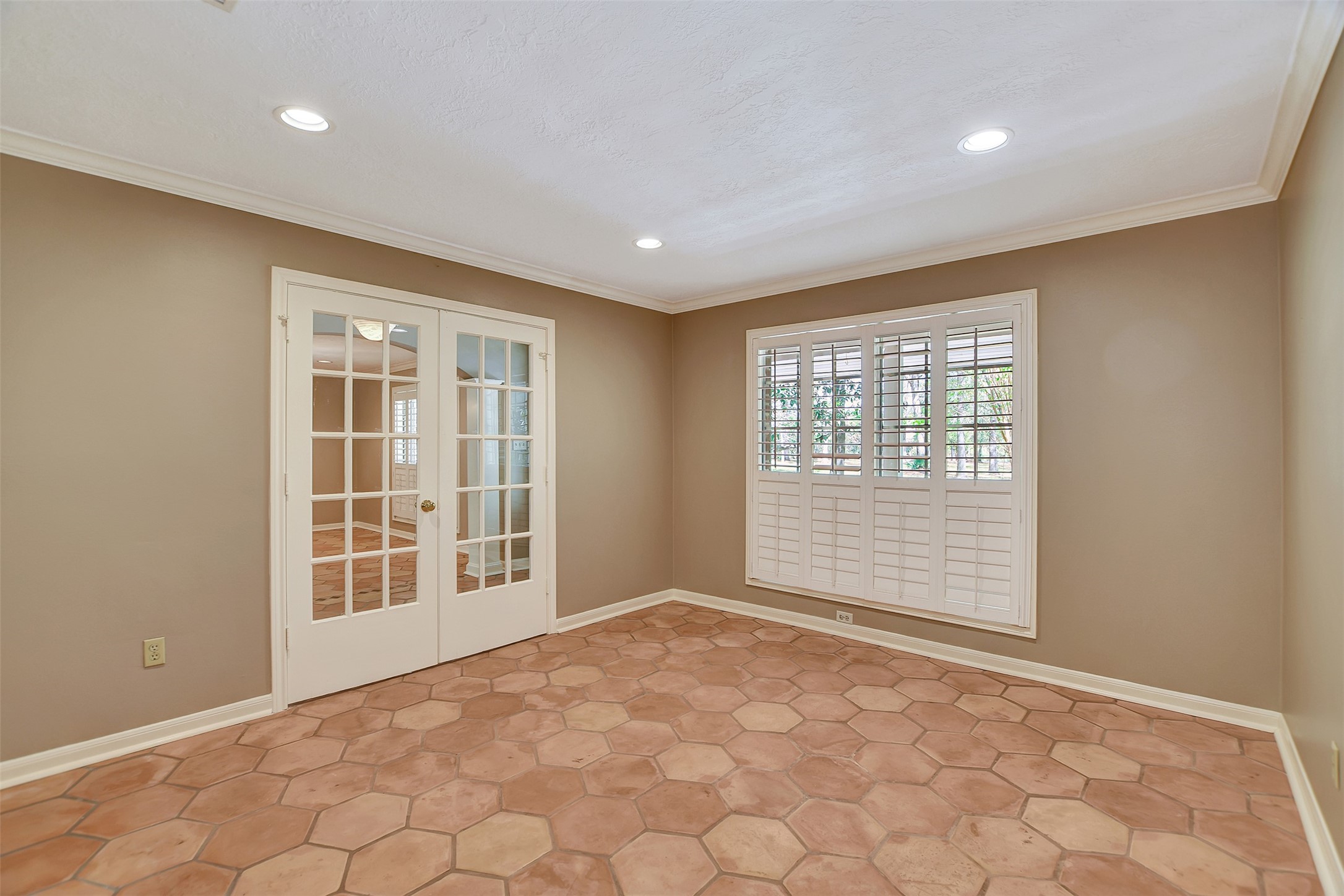 16002 Koenig Lane Conroe, TX 77384 - Photo 19 of 48 a view of an empty room with a window