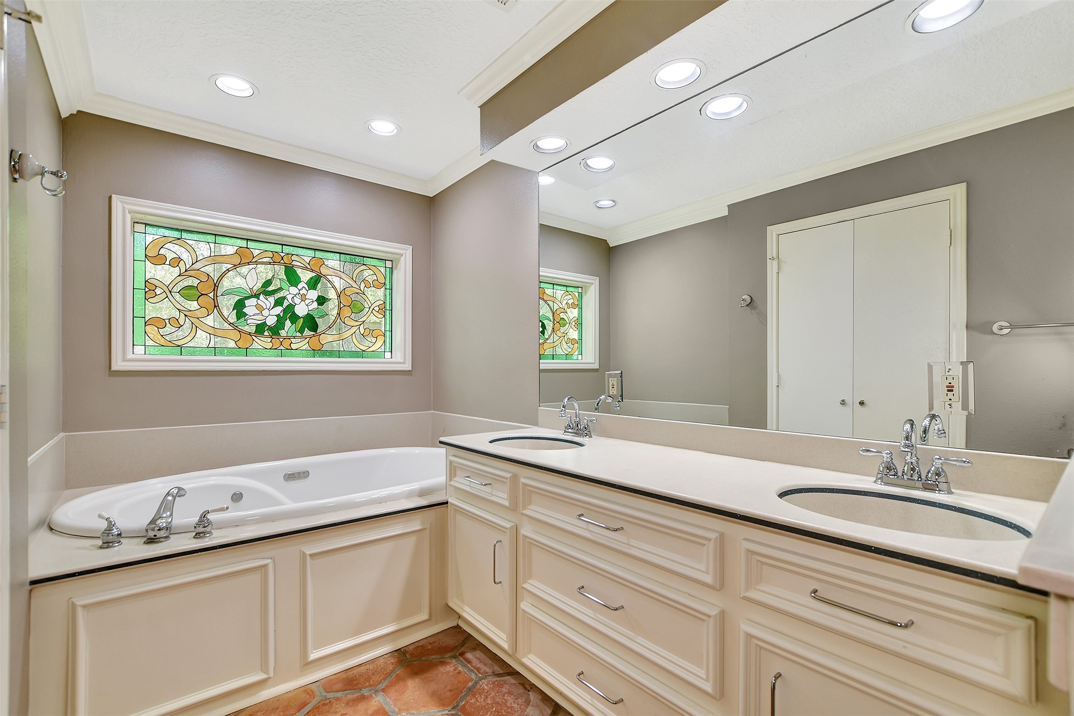 16002 Koenig Lane Conroe, TX 77384 - Photo 23 of 48 a bathroom with a granite countertop sink mirror and window