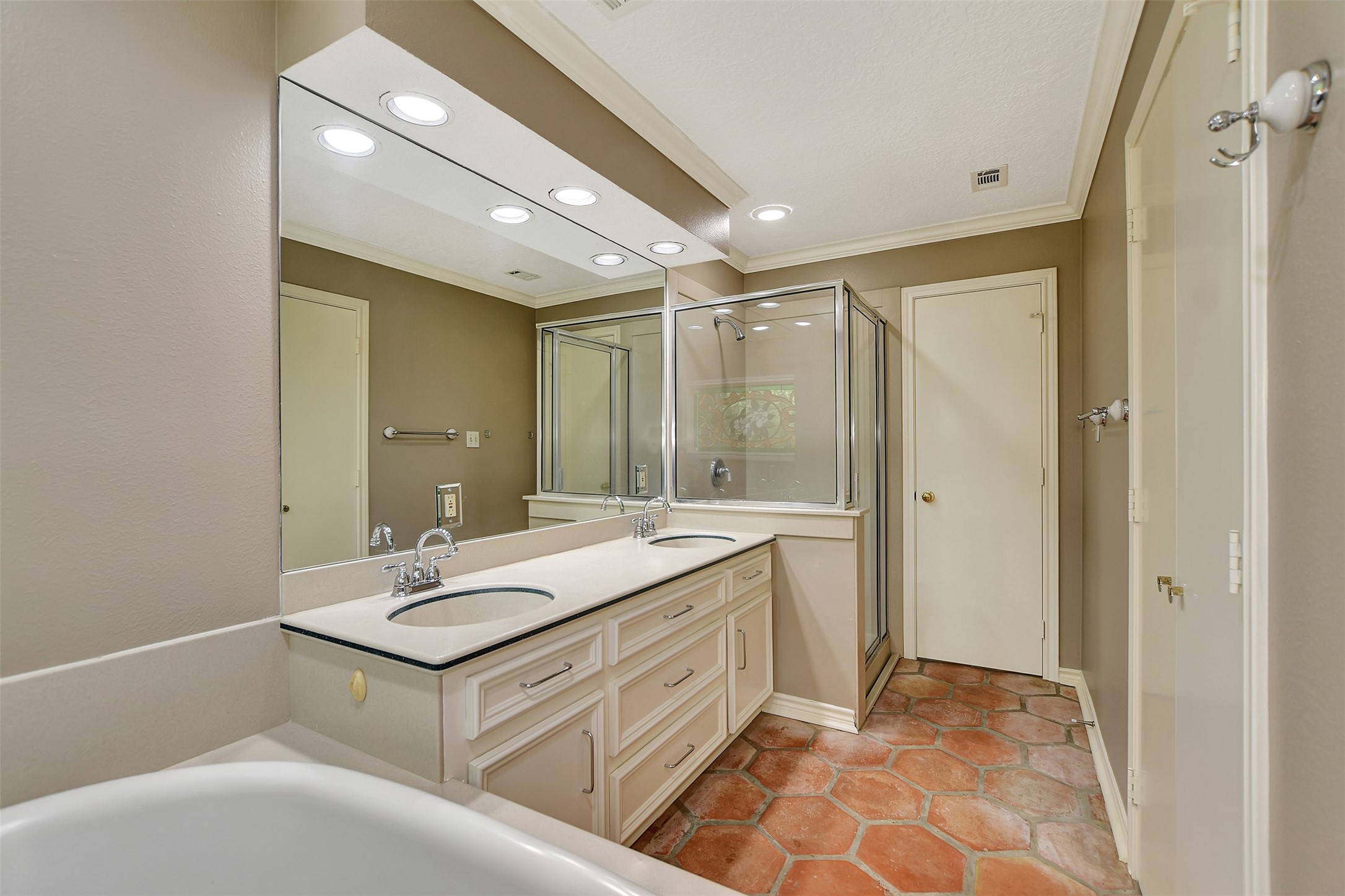16002 Koenig Lane Conroe, TX 77384 - Photo 24 of 48 a bathroom with a sink and a mirror