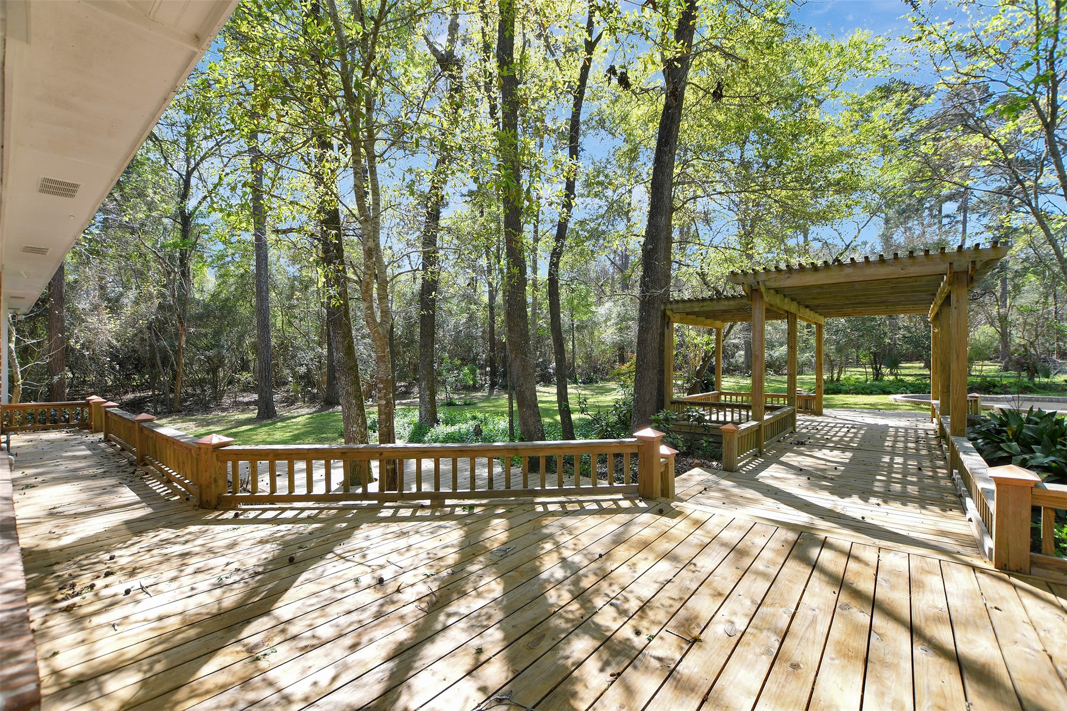 16002 Koenig Lane Conroe, TX 77384 - Photo 35 of 48 a view of a swimming pool with a patio