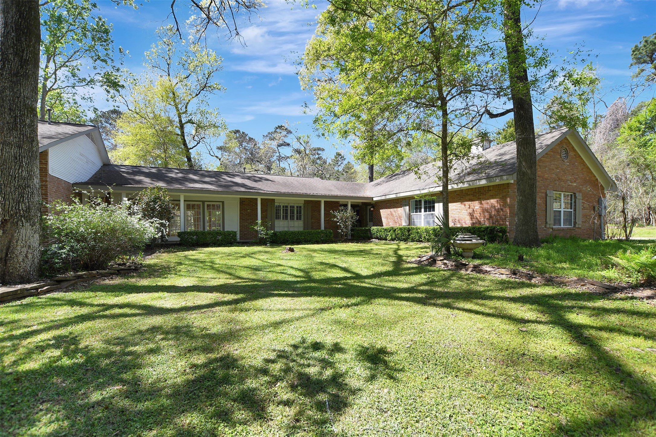 16002 Koenig Lane Conroe, TX 77384 - Photo 4 of 48 a view of a house with a yard