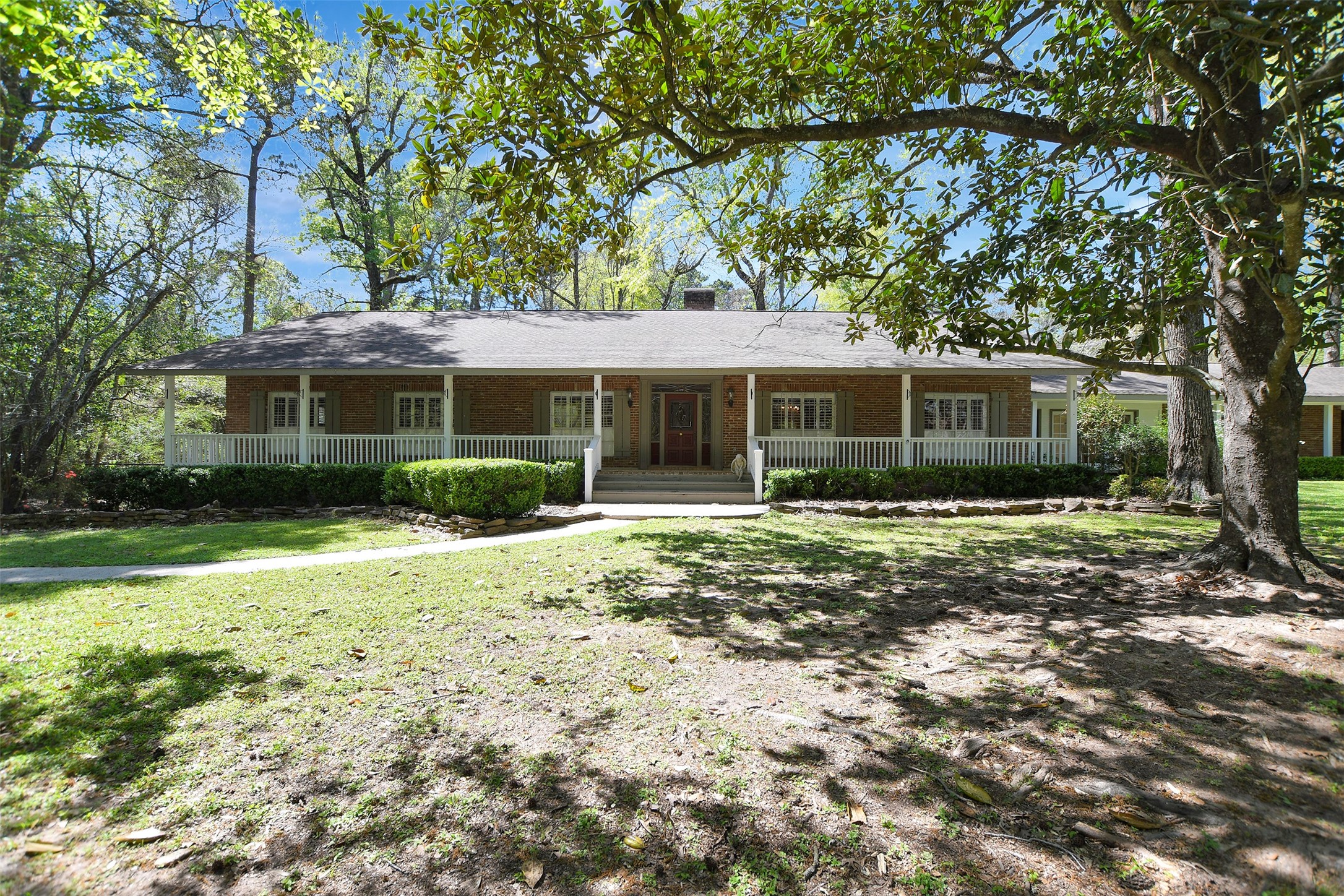 16002 Koenig Lane Conroe, TX 77384 - Photo 5 of 48 a view of a house with a yard