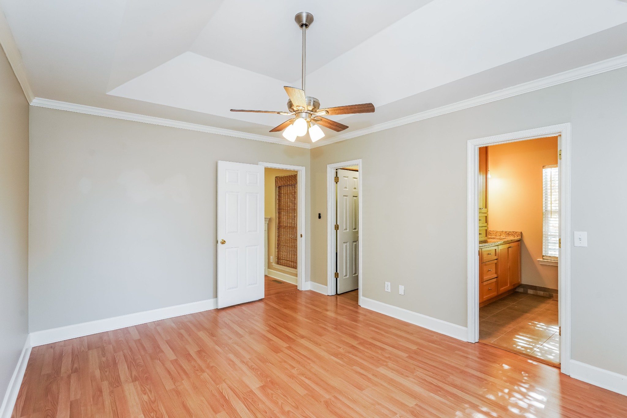 306 Crooked Oak Court Franklin, TN 37067 - Photo 16 of 27 a view of a livingroom with a chandelier & a ceiling fan