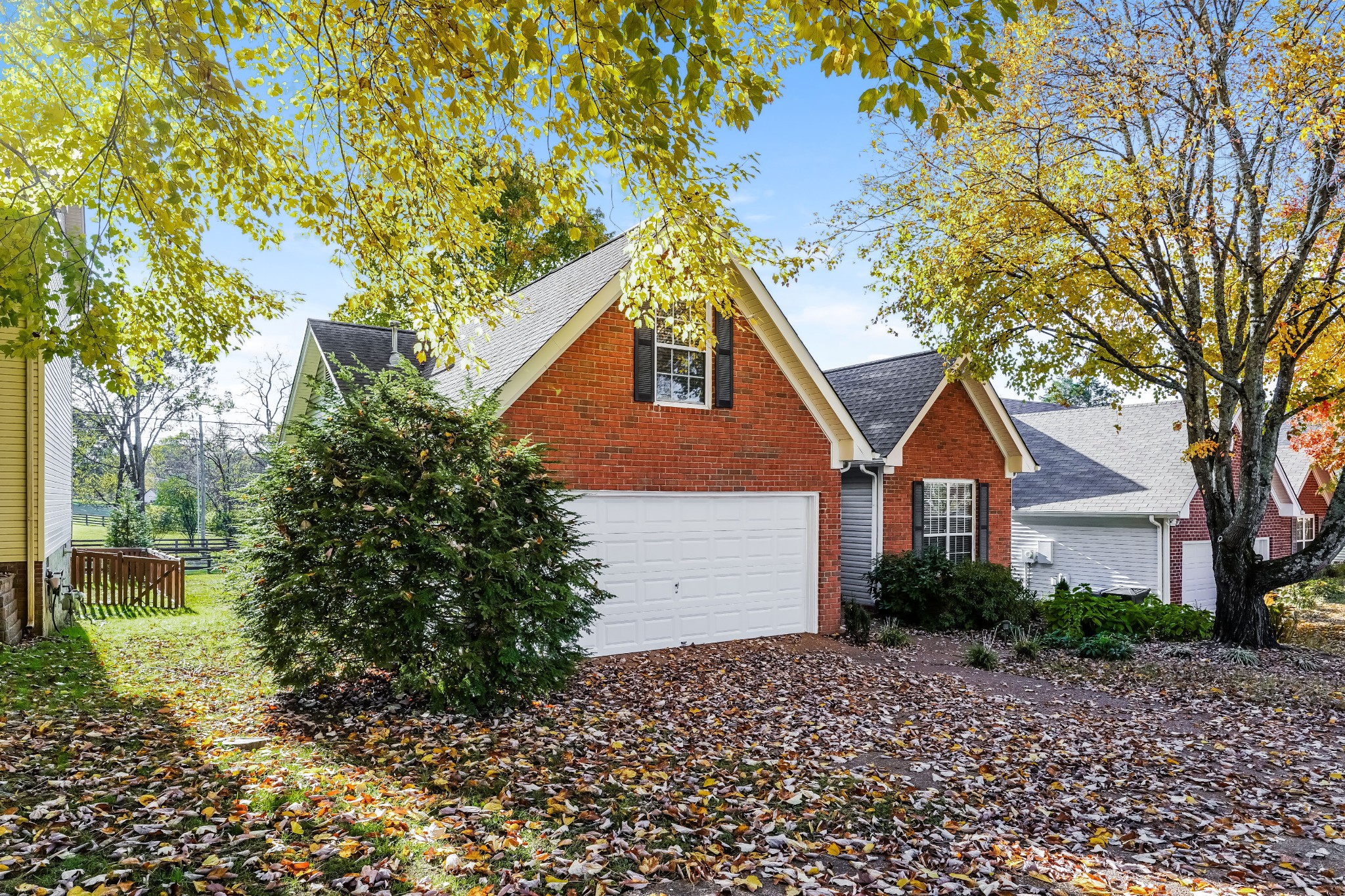 306 Crooked Oak Court Franklin, TN 37067 - Photo 3 of 27 a house that has a tree in front of it