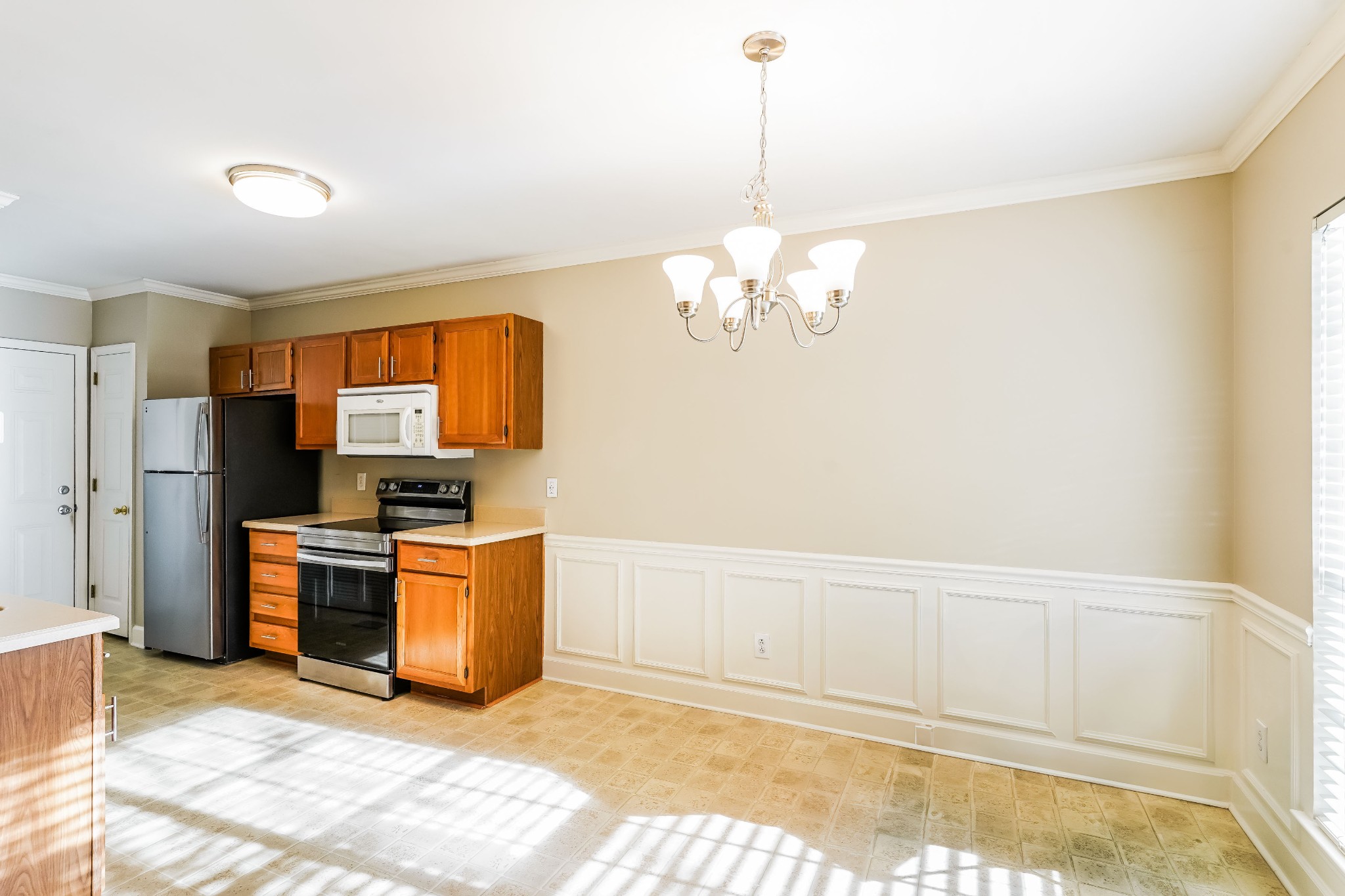 306 Crooked Oak Court Franklin, TN 37067 - Photo 7 of 27 a view of a kitchen with a sink stove and refrigerator