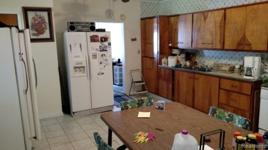 9183 Metcalf Road Avoca, MI 48006 - Photo 2 of 18 This is a view of the kitchen.