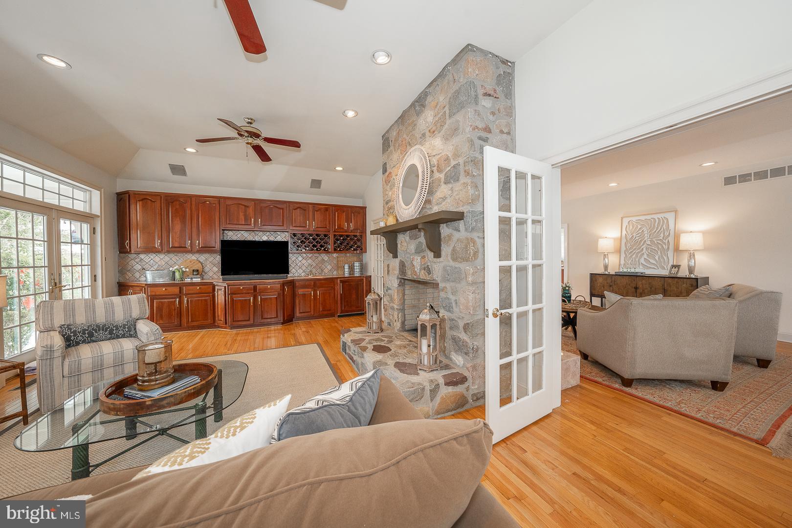400 Orchard Way Wayne, PA 19087 - Photo 12 of 60 a living room with furniture and a flat screen tv