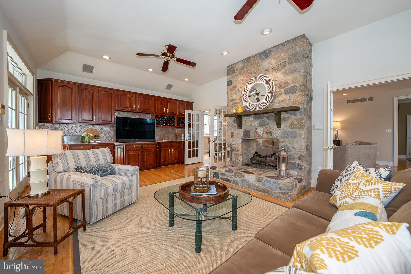 400 Orchard Way Wayne, PA 19087 - Photo 15 of 60 a living room with furniture and a flat screen tv