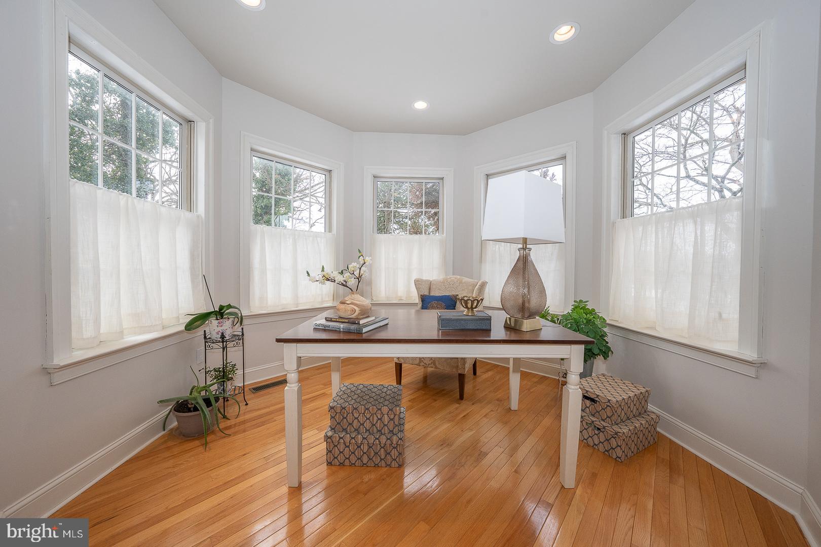 400 Orchard Way Wayne, PA 19087 - Photo 22 of 60 a living room with furniture large window and wooden floor