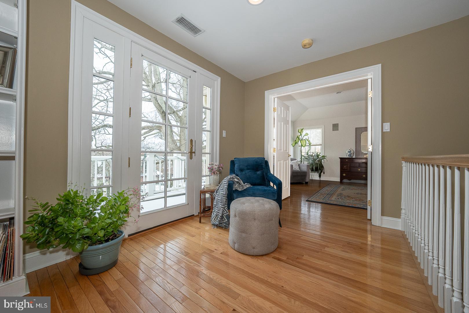 400 Orchard Way Wayne, PA 19087 - Photo 28 of 60 a living room with furniture and a potted plant