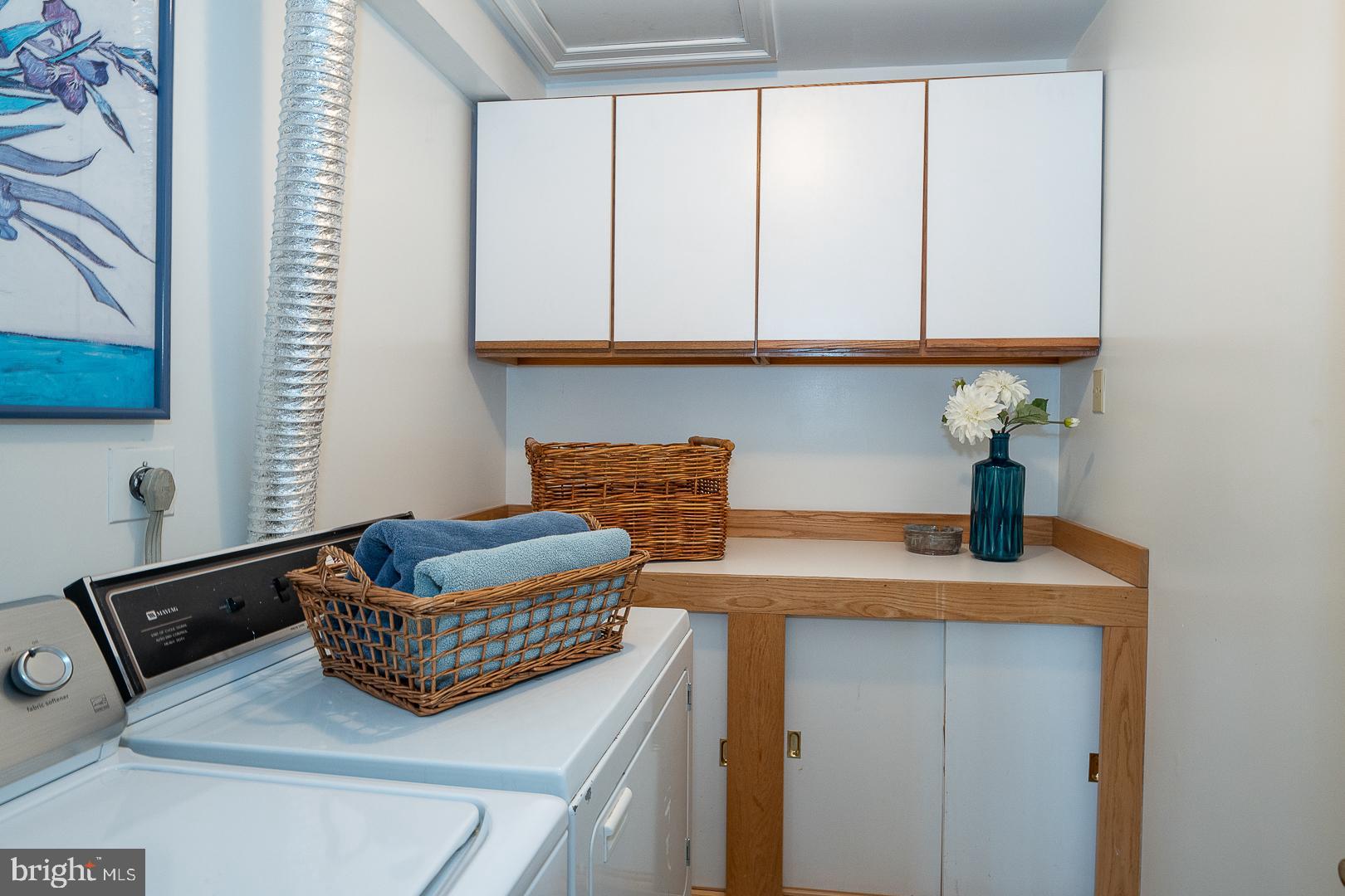 400 Orchard Way Wayne, PA 19087 - Photo 36 of 60 a kitchen with granite countertop cabinets and black stainless steel appliances