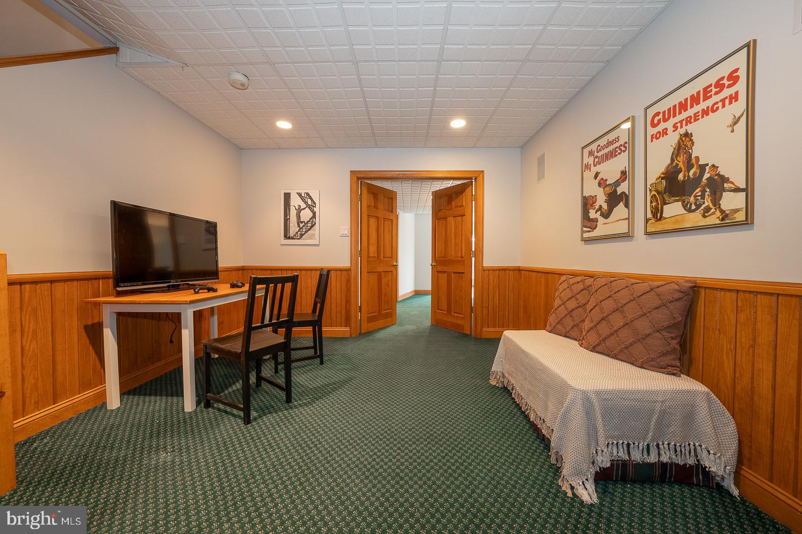 400 Orchard Way Wayne, PA 19087 - Photo 49 of 60 a living room with furniture and a flat screen tv
