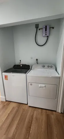 a utility room with dryer and washer