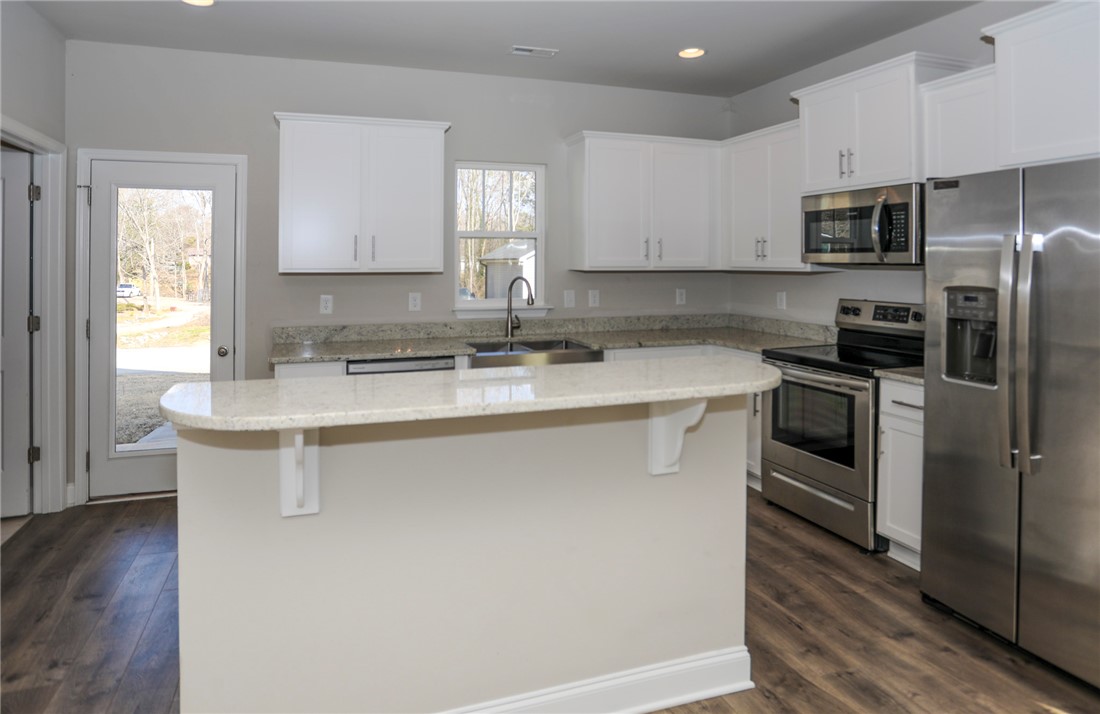 412 Grant Street Easley, SC 29640 - Photo 12 of 40 Kitchen Island w/bar
