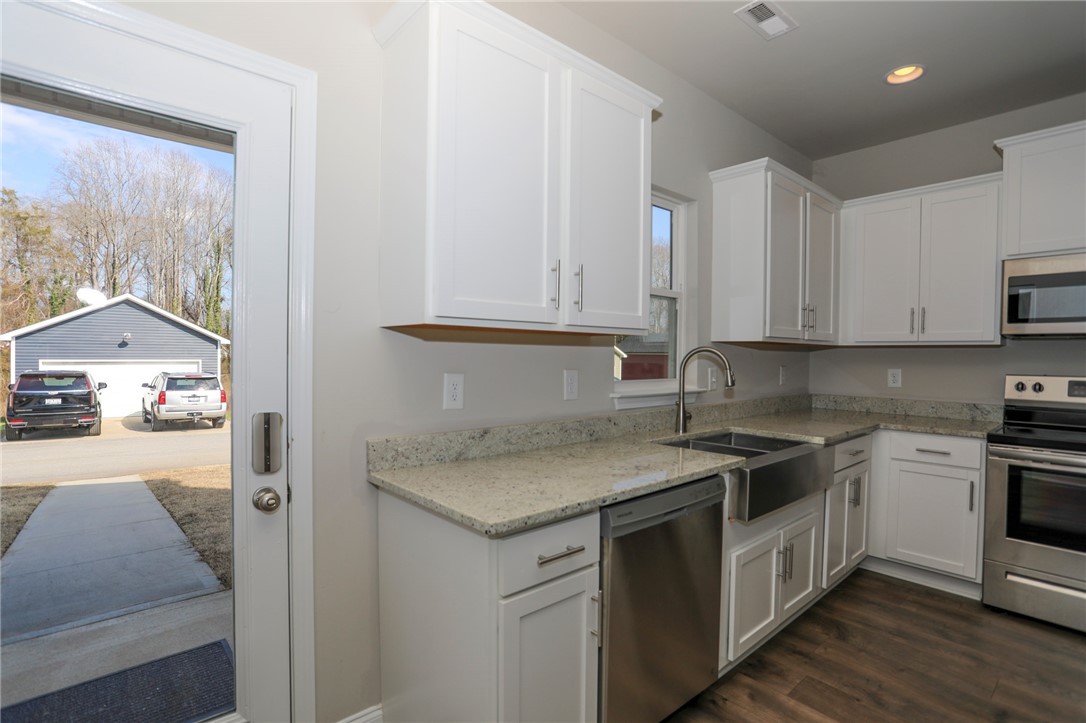 412 Grant Street Easley, SC 29640 - Photo 8 of 40 Kitchen Entry from Rear of Home