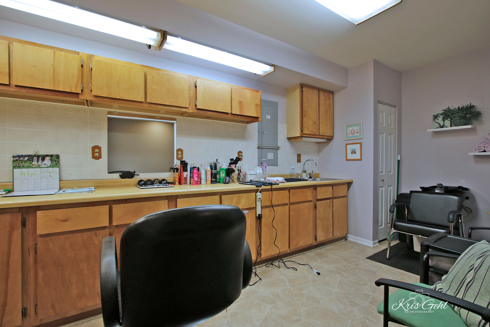 Undisclosed Address Lindenhurst, IL 60046 - Photo 19 of 32 a kitchen with cabinets a sink and appliances