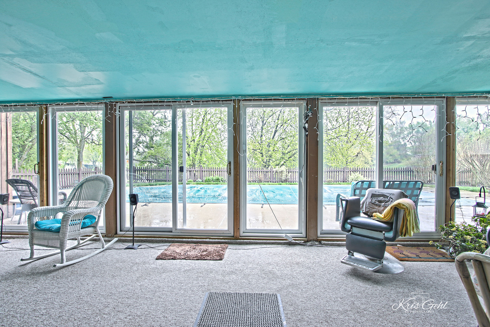 Undisclosed Address Lindenhurst, IL 60046 - Photo 26 of 32 a living room with furniture and floor to ceiling windows