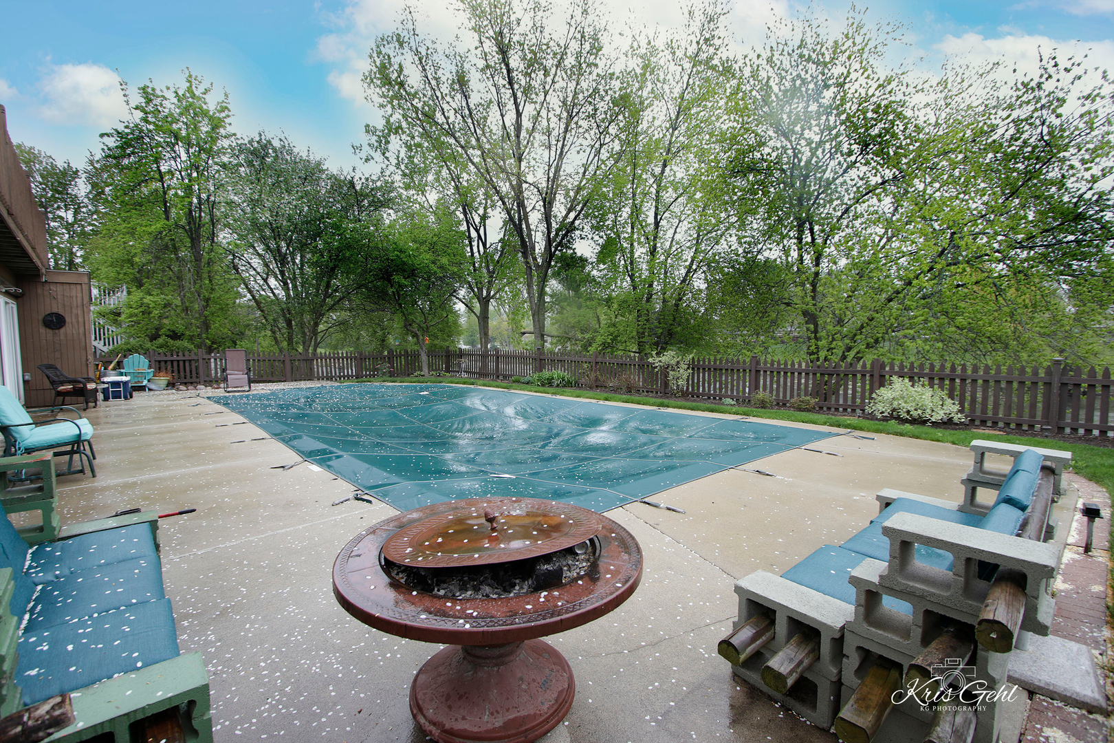 Undisclosed Address Lindenhurst, IL 60046 - Photo 30 of 32 a patio with table and chairs and a fire pit