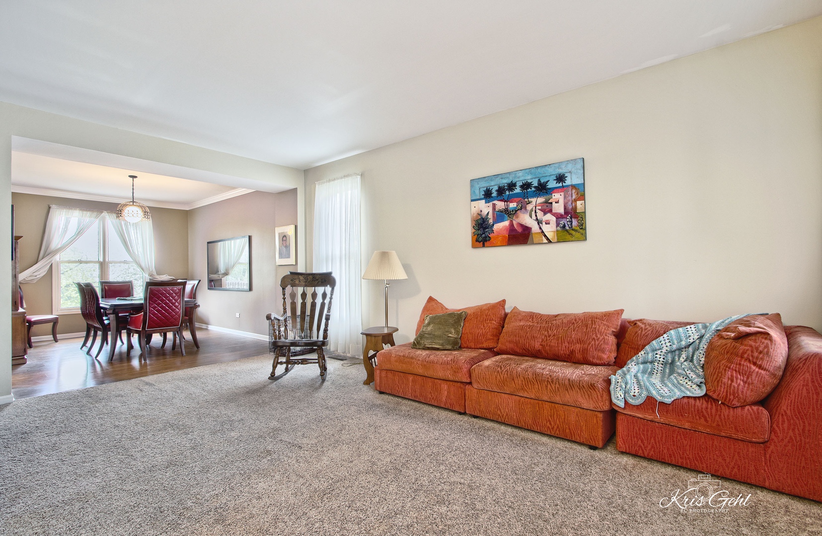Undisclosed Address Lindenhurst, IL 60046 - Photo 3 of 32 a living room with furniture and a dining table