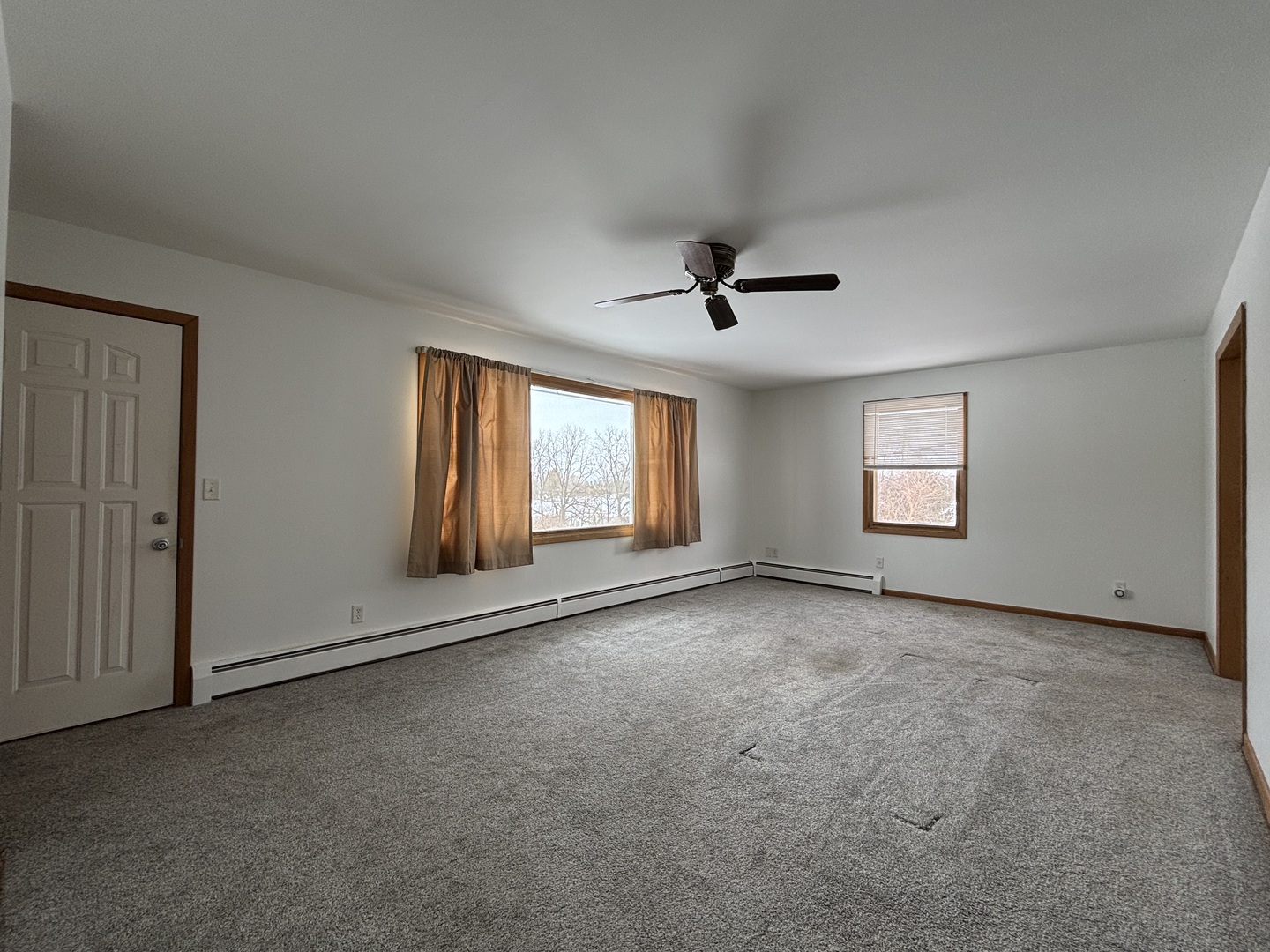 2208 Stieg Road Woodstock, IL 60098 - Photo 7 of 15 a view of empty room with windows