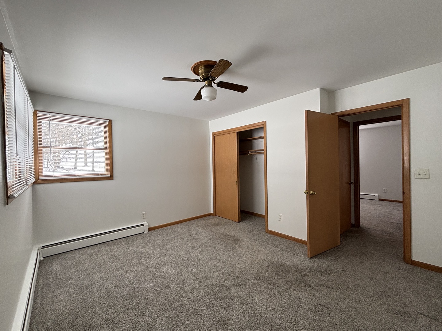 2208 Stieg Road Woodstock, IL 60098 - Photo 9 of 15 a view of a livingroom with a ceiling fan and entryway