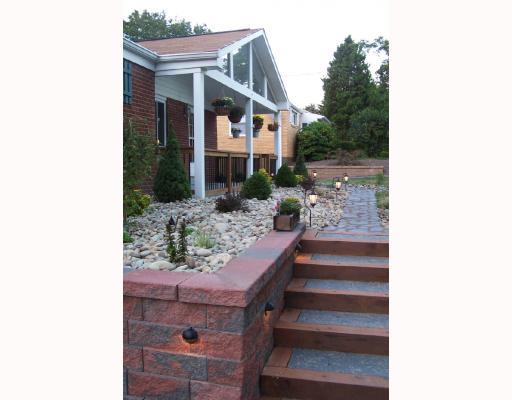 563 Beatty Road Monroeville, PA 15146 - Photo 4 of 17 Exterior Front. Professionally landscaped with versa lock wall special lighting.