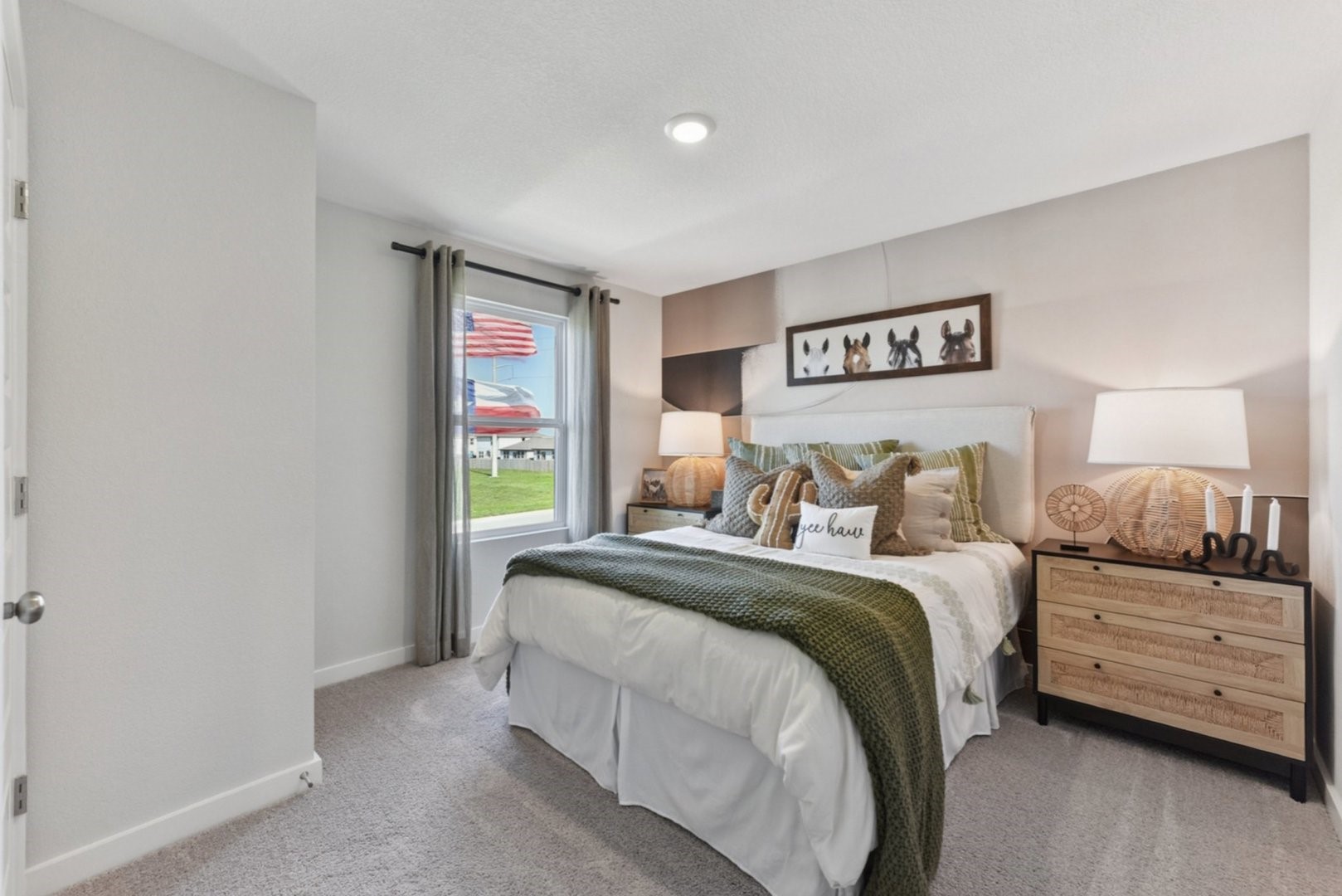 233 Escape Way Jarrell, TX 76537 - Photo 12 of 22 a bedroom with a bed and a window