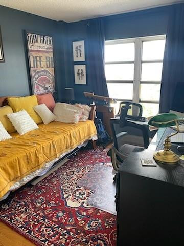 4174 Inverrary Drive, Unit 1015 Lauderhill, FL 33319 - Photo 12 of 15 a bedroom with bed and a window