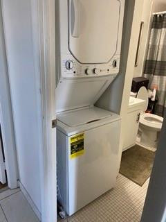 4174 Inverrary Drive, Unit 1015 Lauderhill, FL 33319 - Photo 13 of 15 a utility room with dryer and washer