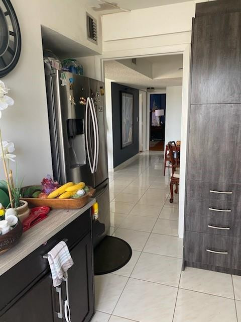 4174 Inverrary Drive, Unit 1015 Lauderhill, FL 33319 - Photo 3 of 15 a hallway with a table and a chairs