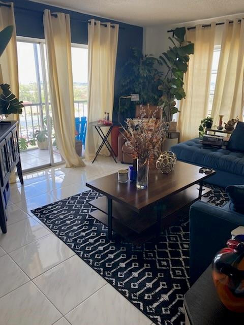 4174 Inverrary Drive, Unit 1015 Lauderhill, FL 33319 - Photo 8 of 15 a view of a dining room with furniture window and wooden floor