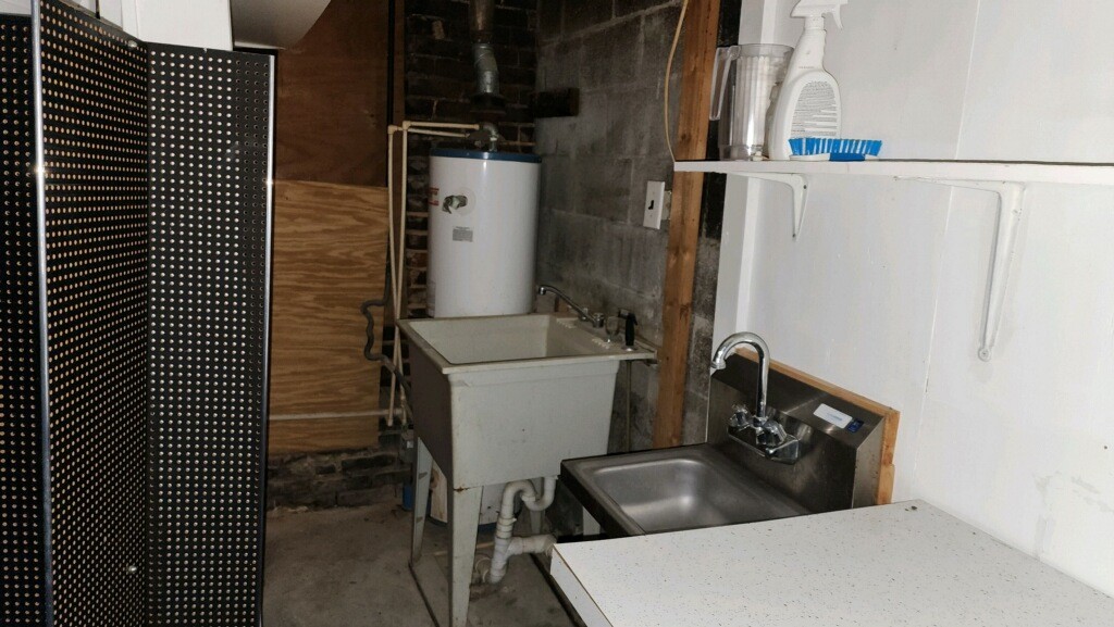 636 Main Street Friendship, TN 38034 - Photo 15 of 17 a bathroom with a sink and toilet