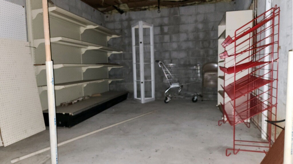 636 Main Street Friendship, TN 38034 - Photo 16 of 17 a room with water heater and storage