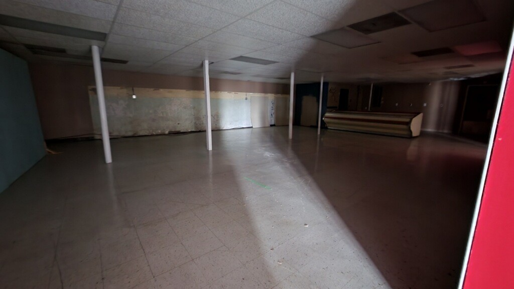 636 Main Street Friendship, TN 38034 - Photo 7 of 17 a view of a hallway with wooden floor