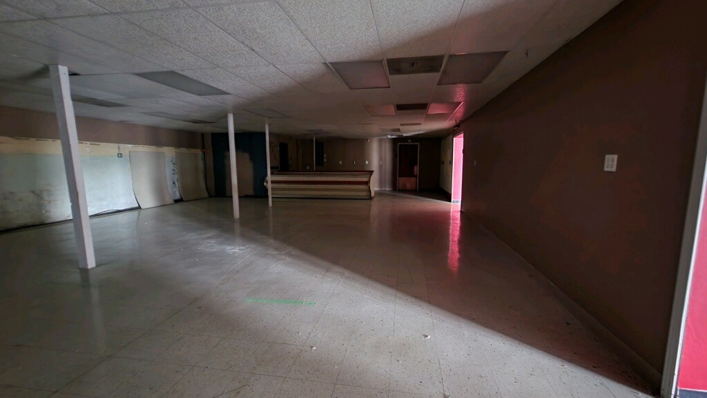 636 Main Street Friendship, TN 38034 - Photo 8 of 17 an empty room with a empty space and windows