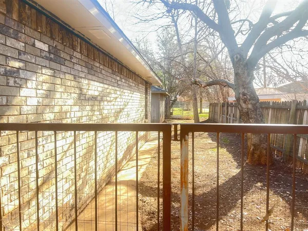 a view of outdoor with large trees