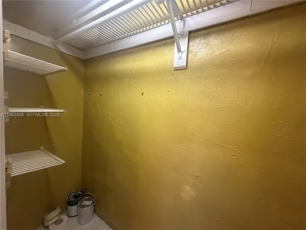 a bathroom with a toilet and a bathtub