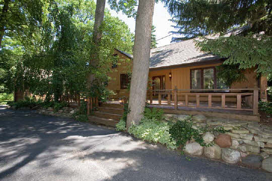 4808 Spring Creek Road Rockford, IL 61114 - Photo 1 of 6 a view of a house with a yard