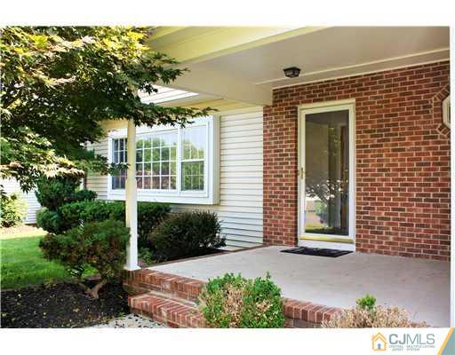 26 Ridge Road Edison, NJ 08817 - Photo 2 of 23 a view of a house with potted plants